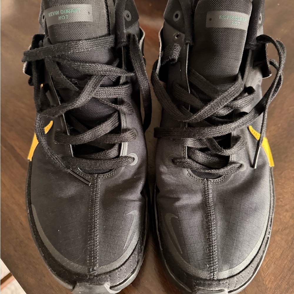Nike Men's Black Athletic Sneakers with Yellow Accents